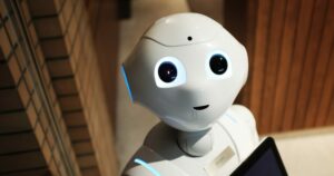 white robot looking at the camera